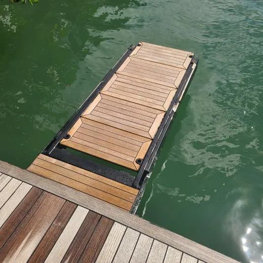  Yacht Photos Pics Wooden boat ramp on water, Anvera 55, 2016 model.
