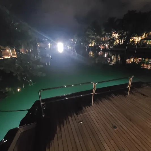  Yacht Photos Pics Night view from Anvera 55 yacht, 2016, overlooking illuminated water and distant lights.