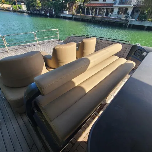  Yacht Photos Pics Luxury seating on 2016 Anvera 55 yacht deck, overlooking serene waterfront.