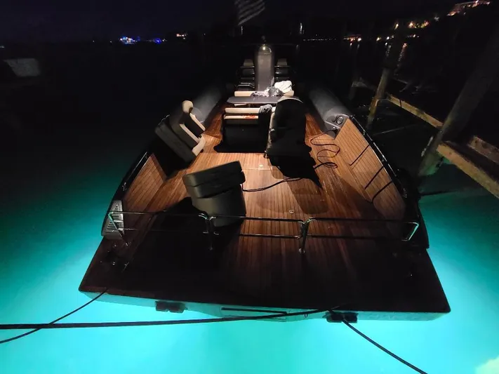  Yacht Photos Pics Luxurious 2016 Anvera 55 boat with illuminated deck at night.