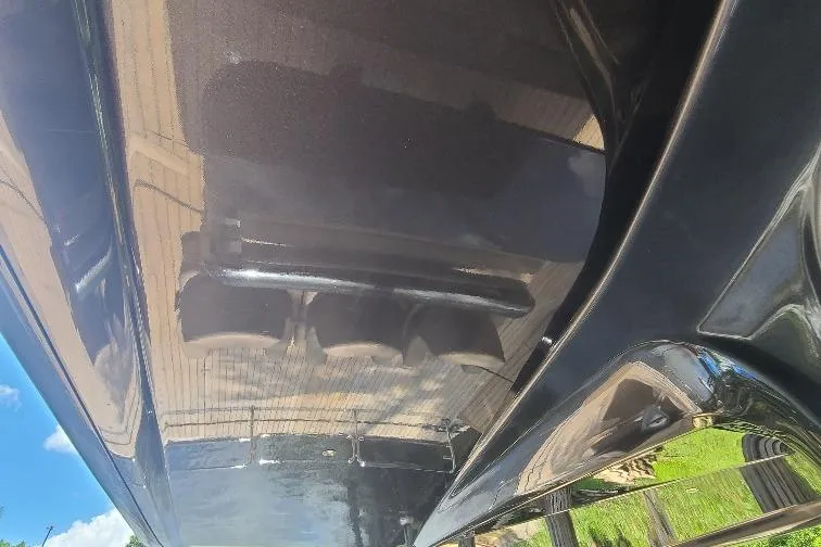  Yacht Photos Pics Underneath view of a sleek 2016 Anvera 55 boat, showcasing its polished hull design.