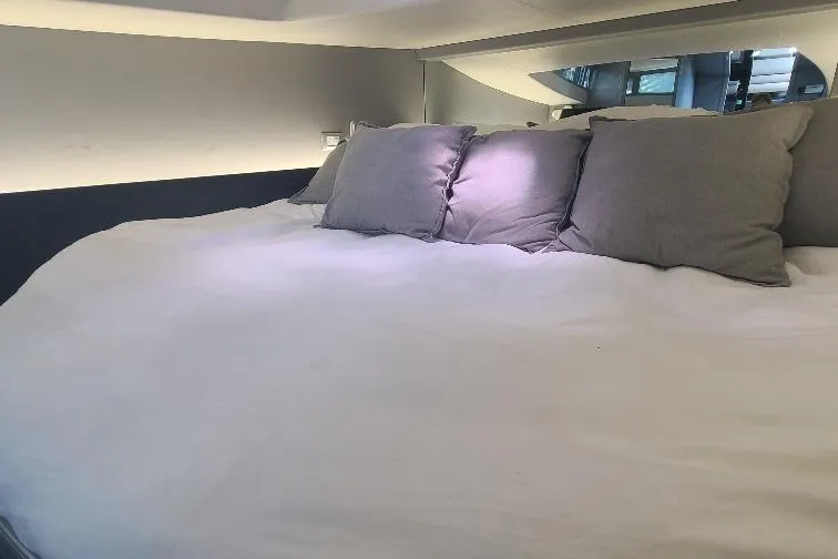  Yacht Photos Pics Luxurious bed in 2016 Anvera 55 yacht cabin with plush pillows.