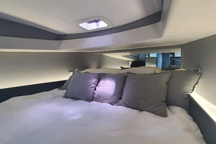  Yacht Photos Pics Luxurious cabin interior of 2016 Anvera 55 yacht with plush bedding and modern design.