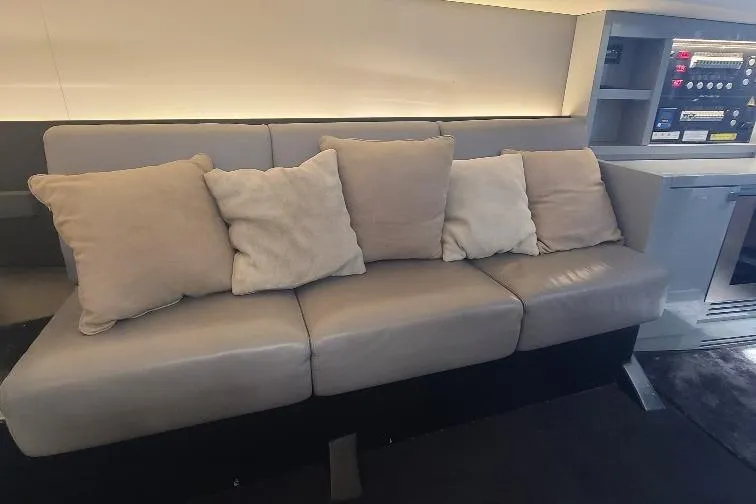  Yacht Photos Pics Luxurious beige sofa with cushions inside a 2016 Anvera 55 yacht.