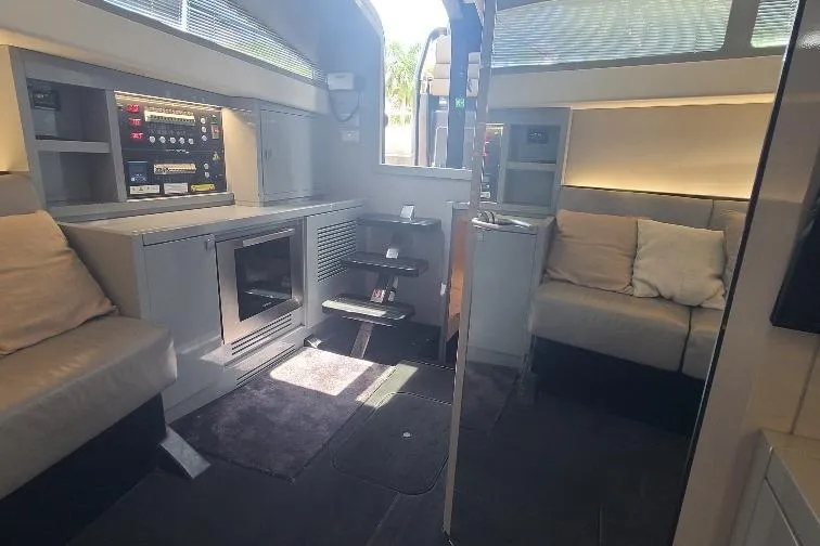  Yacht Photos Pics Luxurious interior of a 2016 Anvera 55 yacht with modern seating and control panel.