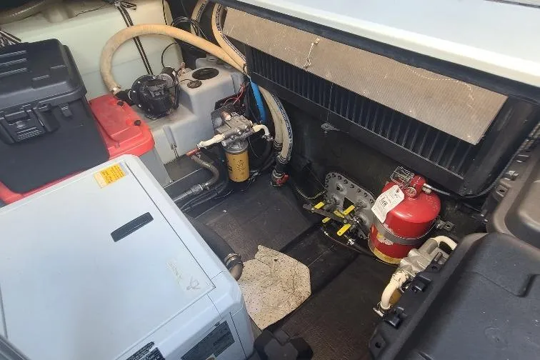  Yacht Photos Pics Engine room of a 2016 Anvera 55 boat, featuring mechanical components and safety equipment.