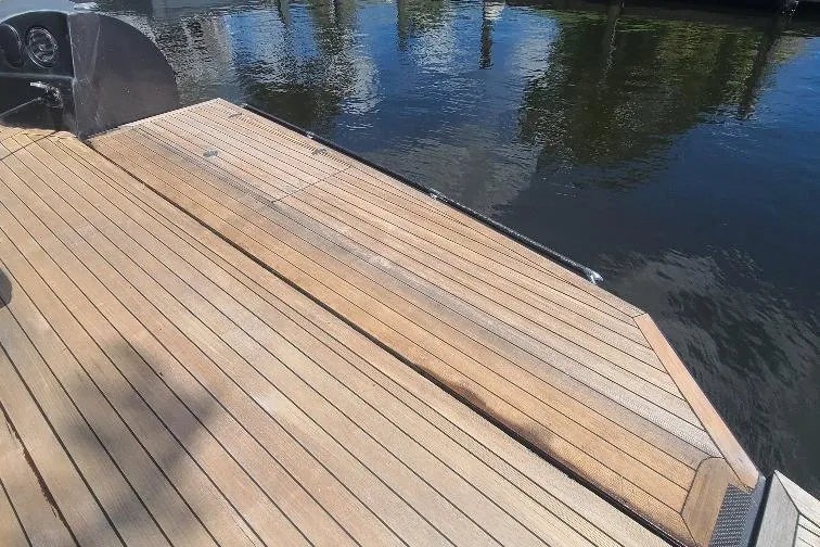  Yacht Photos Pics Teak deck of 2016 Anvera 55 yacht by the water.