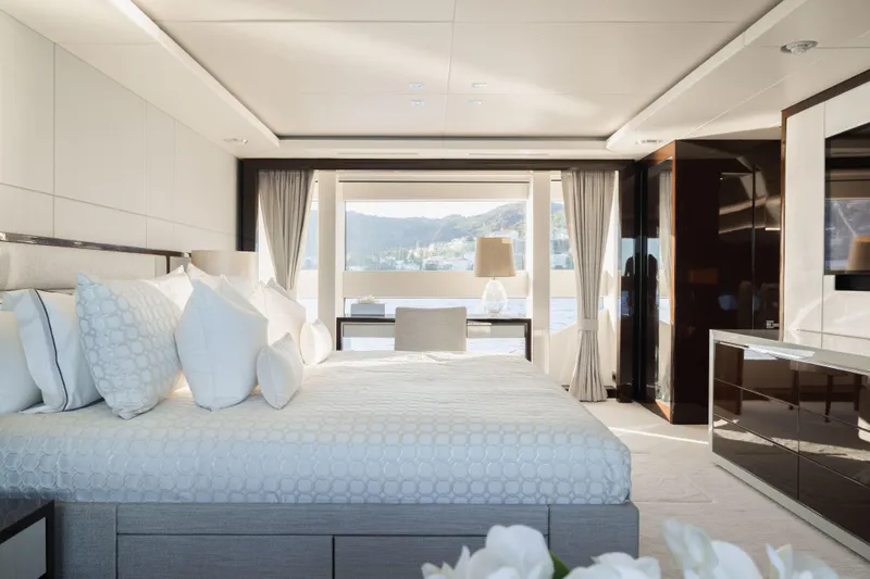 King Power Yacht Photos Pics Luxurious bedroom interior on 2016 Sunseeker 116 Yacht with scenic window view.