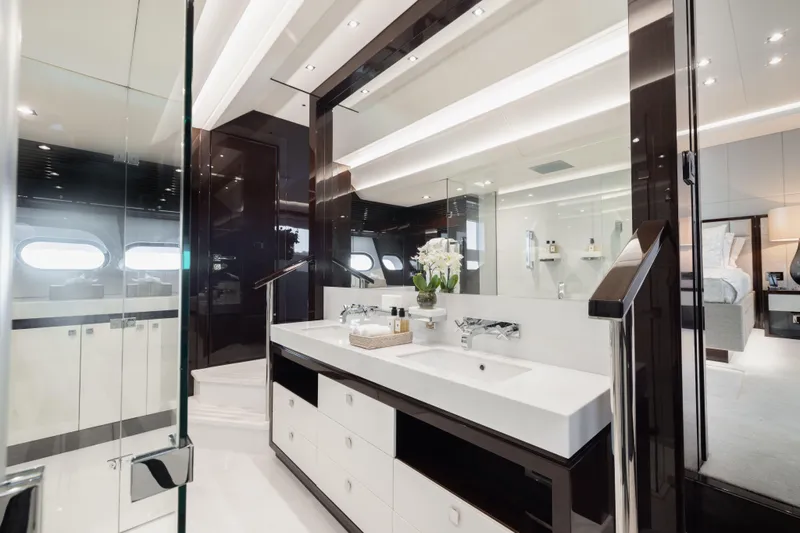 King Power Yacht Photos Pics Luxurious bathroom interior on 2016 Sunseeker 116 Yacht, featuring modern design and elegant fixtures.