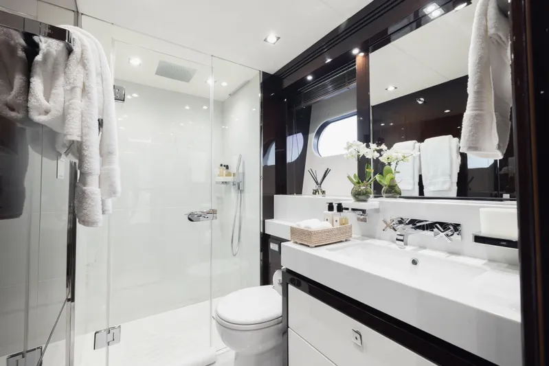 King Power Yacht Photos Pics Luxurious bathroom on 2016 Sunseeker 116 Yacht with modern fixtures and elegant decor.