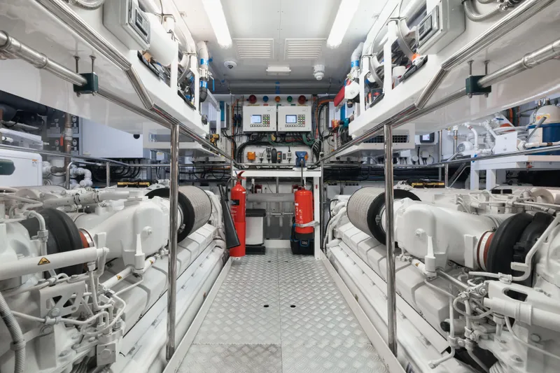 King Power Yacht Photos Pics Engine room of 2016 Sunseeker 116 Yacht, featuring advanced machinery and safety equipment.