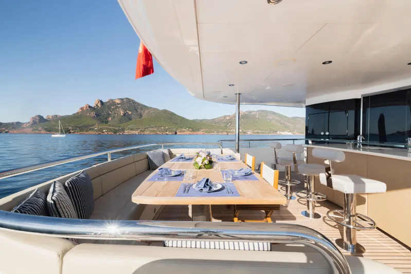 King Power Yacht Photos Pics Luxurious Sunseeker 116 Yacht 2016 with elegant outdoor dining area and scenic ocean view.