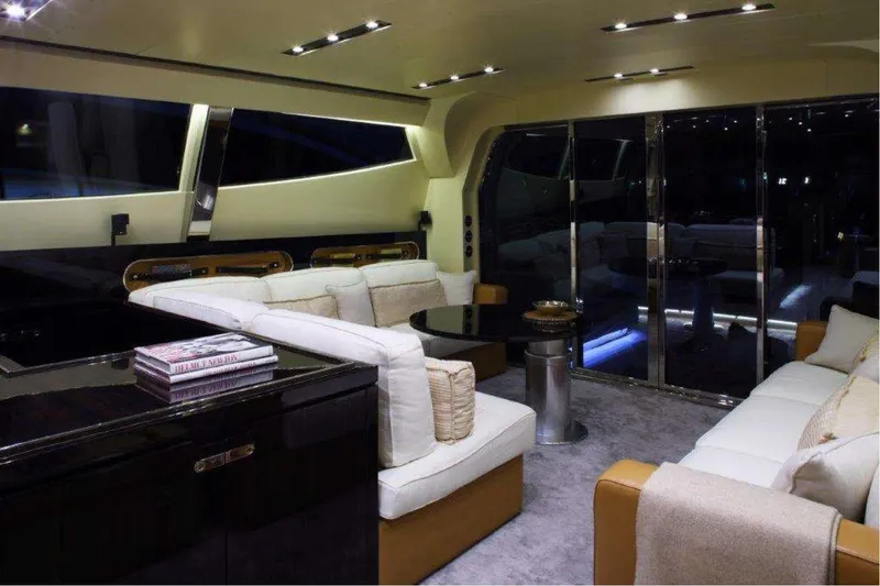  Yacht Photos Pics Luxurious interior of a 2011 Otam 80 HT yacht with elegant seating and modern design.