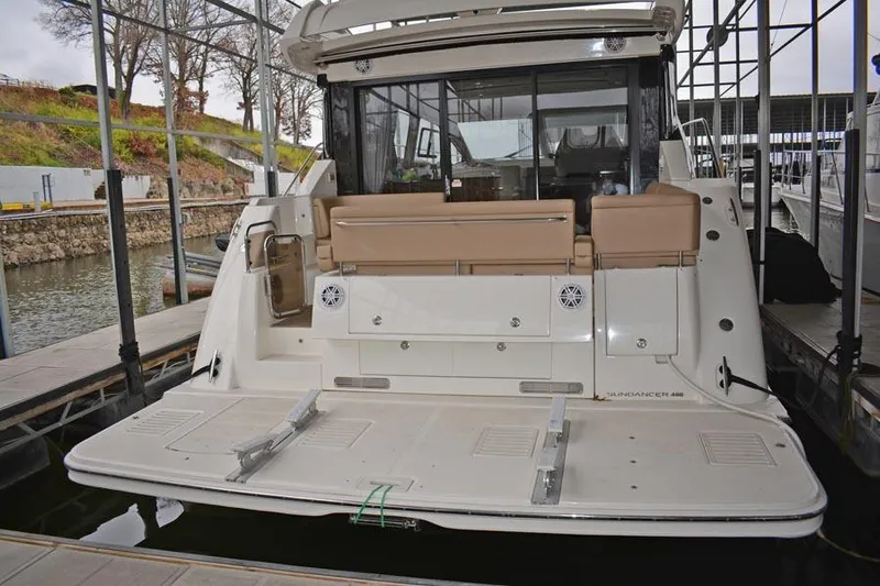  Yacht Photos Pics 2017 Sea Ray Sundancer 460 yacht docked, showcasing spacious rear deck and seating area.