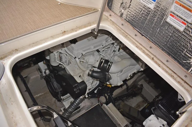  Yacht Photos Pics Engine compartment of 2017 Sea Ray Sundancer 460, showcasing mechanical components and layout.