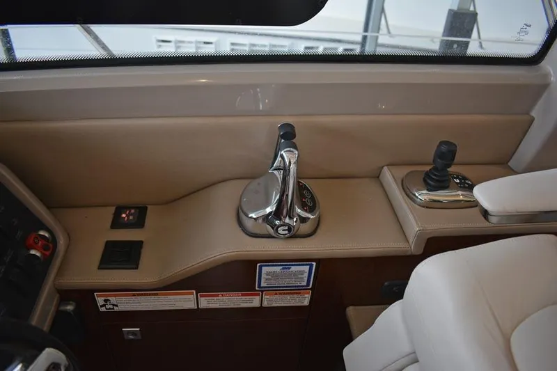  Yacht Photos Pics 2017 Sea Ray Sundancer 460 helm controls with joystick and throttle.