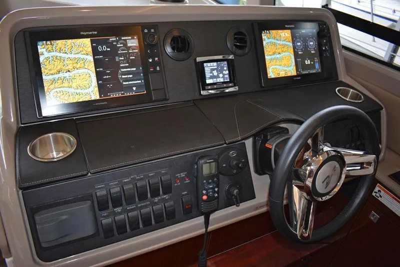  Yacht Photos Pics 2017 Sea Ray Sundancer 460 helm with advanced navigation displays and controls.