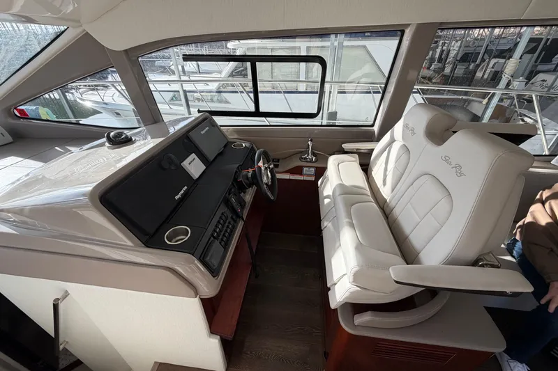  Yacht Photos Pics 2017 Sea Ray Sundancer 460 helm with dual seats and modern controls.