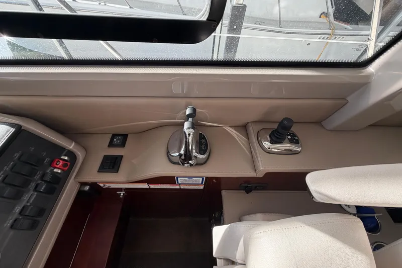  Yacht Photos Pics 2017 Sea Ray Sundancer 460 helm controls with joystick and throttle levers.