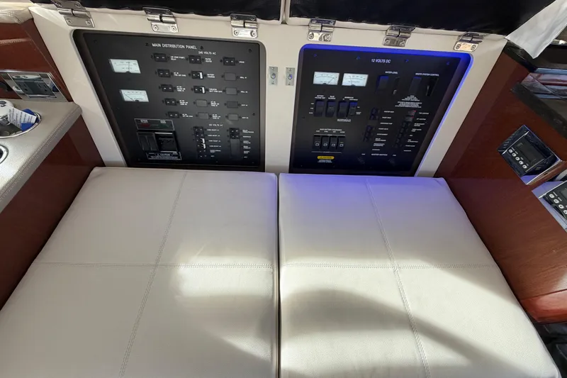  Yacht Photos Pics 2017 Sea Ray Sundancer 460 electrical panel with cushioned seating.