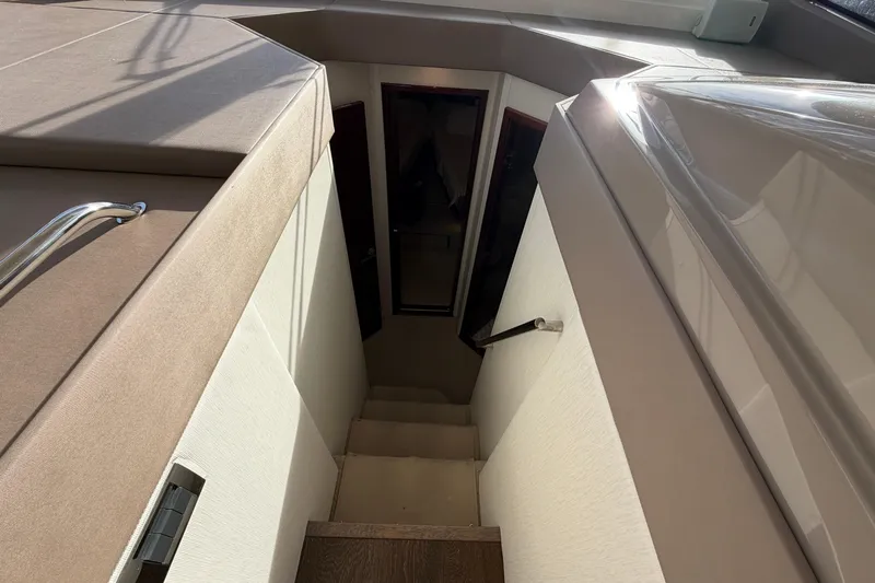  Yacht Photos Pics Stairway inside 2017 Sea Ray Sundancer 460 yacht, featuring sleek design and modern materials.