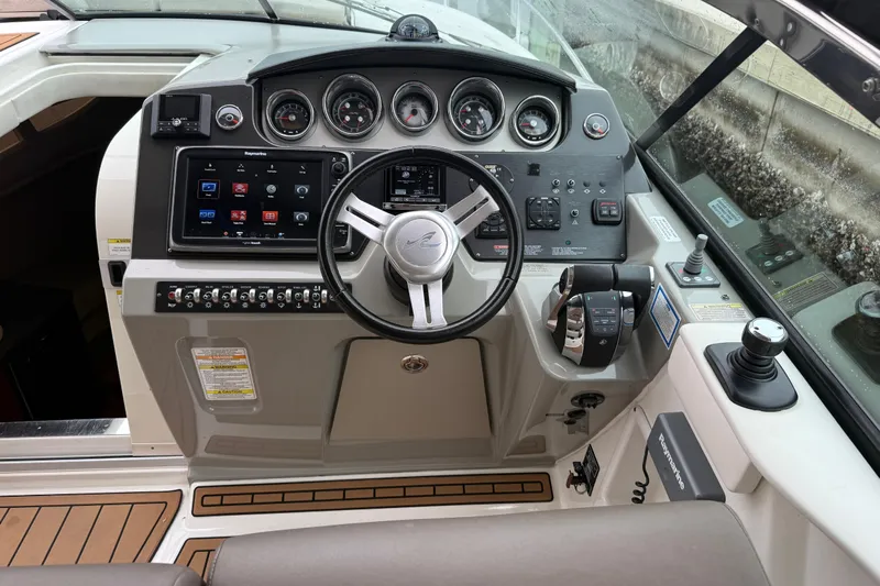  Yacht Photos Pics 2014 Sea Ray 370 Venture helm with advanced controls and navigation system.