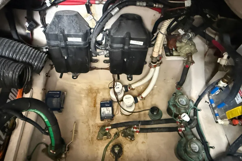  Yacht Photos Pics Engine compartment of a 2014 Sea Ray 370 Venture boat, showing various mechanical components.