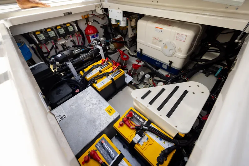 Pachanga Yacht Photos Pics Engine room of a 2021 Boston Whaler 420 Outrage with batteries and equipment.