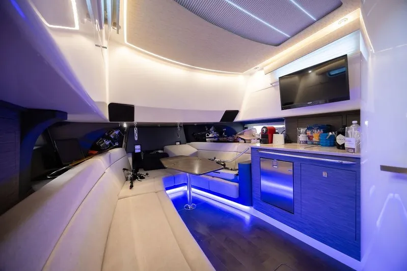 Pachanga Yacht Photos Pics Luxurious interior of 2021 Boston Whaler 420 Outrage with modern amenities and ambient lighting.