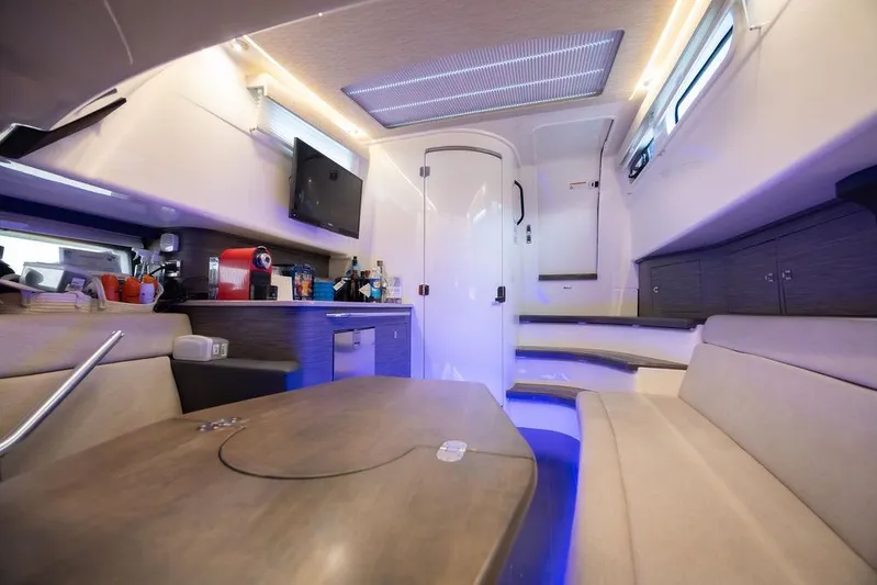 Pachanga Yacht Photos Pics Luxurious interior of 2021 Boston Whaler 420 Outrage with modern amenities and seating.