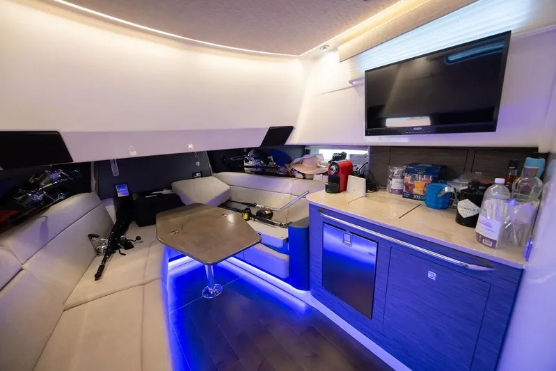 Pachanga Yacht Photos Pics Luxurious interior of 2021 Boston Whaler 420 Outrage with modern amenities and ambient lighting.