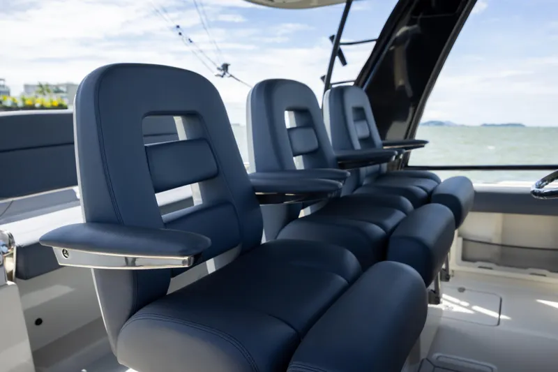 Pachanga Yacht Photos Pics Luxurious seating on 2021 Boston Whaler 420 Outrage boat, featuring sleek design and comfort.