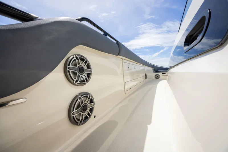 Pachanga Yacht Photos Pics 2021 Boston Whaler 420 Outrage interior with speakers and storage compartments.