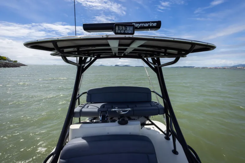 Pachanga Yacht Photos Pics Boston Whaler 420 Outrage 2021 on open water, featuring sleek design and advanced navigation.