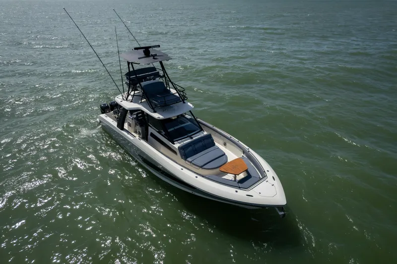 Pachanga Yacht Photos Pics 2021 Boston Whaler 420 Outrage boat cruising on open water.