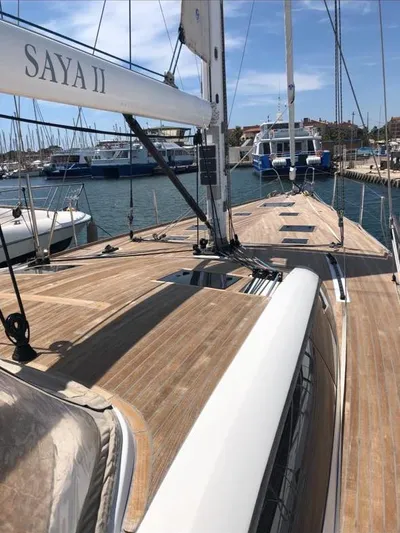 4850 Yacht Photos Pics Sailing yacht CNB BORDEAUX 60, 2013 model, docked in a sunny marina.