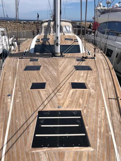 4850 Yacht Photos Pics 2013 CNB BORDEAUX 60 yacht deck with sleek wooden finish and multiple skylights.