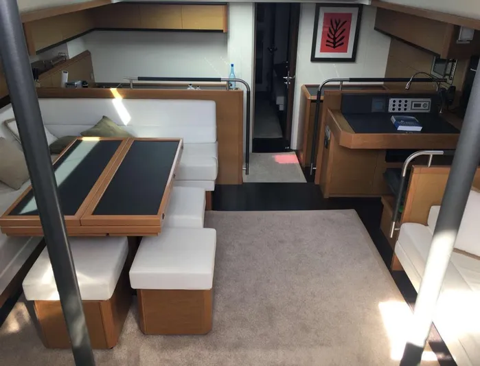 4850 Yacht Photos Pics Luxurious interior of 2013 CNB BORDEAUX 60 yacht with modern dining and kitchen area.