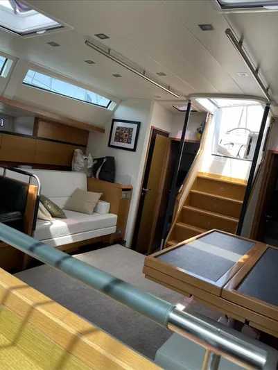 4850 Yacht Photos Pics Luxurious interior of 2013 CNB BORDEAUX 60 yacht with modern furnishings and ample natural light.