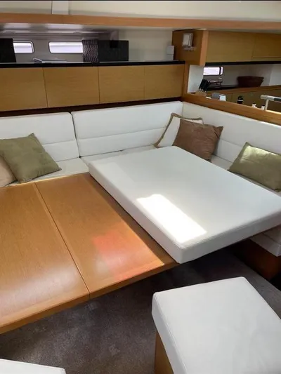 4850 Yacht Photos Pics Luxurious interior of 2013 CNB BORDEAUX 60 yacht with elegant seating and cushions.