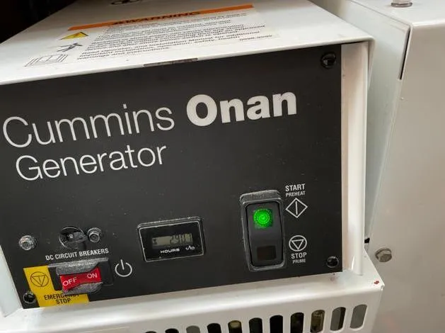 4850 Yacht Photos Pics Cummins Onan generator control panel on CNB BORDEAUX 60 yacht, 2013 model.