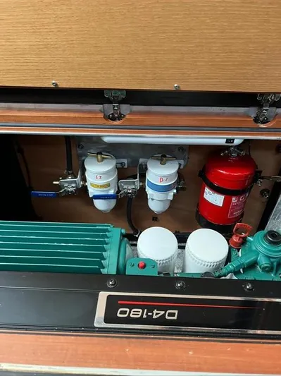 4850 Yacht Photos Pics Engine compartment of 2013 CNB BORDEAUX 60 yacht with filters and fire extinguisher.