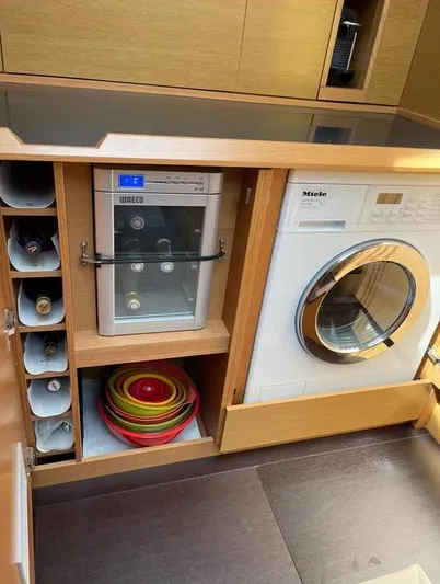 4850 Yacht Photos Pics Laundry and wine storage area on a 2013 CNB BORDEAUX 60 yacht.
