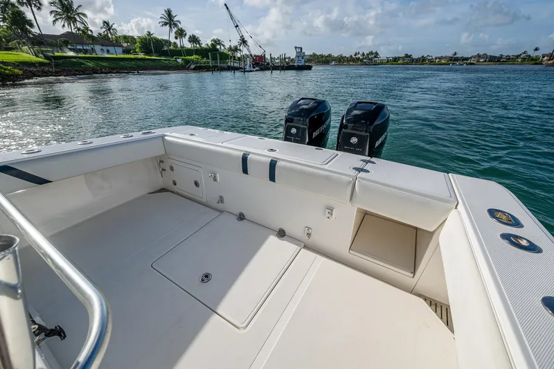 Poliseas Yacht Photos Pics 2006 Bahama 31 boat with dual engines, docked in a scenic waterfront location.