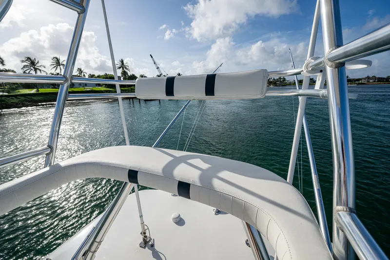 Poliseas Yacht Photos Pics Tower view from a 2006 Bahama 31 boat, overlooking calm waters and palm trees.