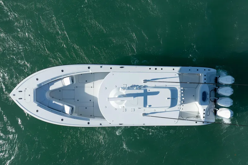  Yacht Photos Pics Top view of 2022 Yellowfin 39 Offshore boat on green water.