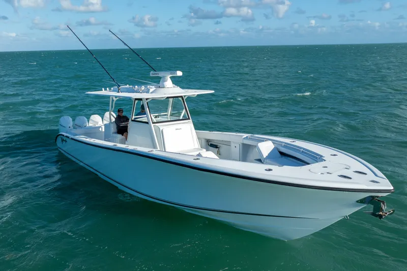  Yacht Photos Pics 2022 Yellowfin 39 Offshore boat cruising on open sea under clear skies.