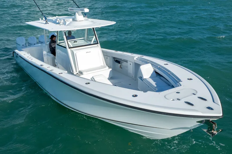  Yacht Photos Pics 2022 Yellowfin 39 Offshore boat cruising on open water.
