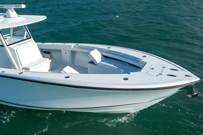  Yacht Photos Pics 2022 Yellowfin 39 Offshore boat cruising on open water.