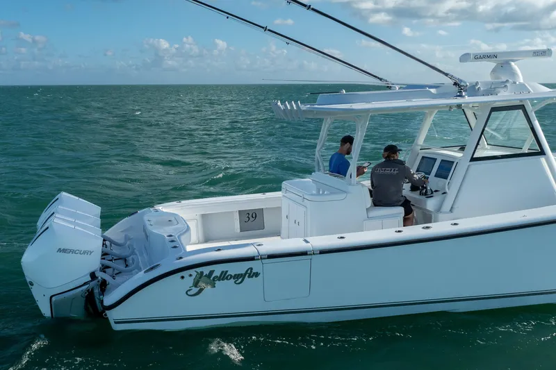  Yacht Photos Pics 2022 Yellowfin 39 Offshore boat on open water, featuring Mercury engines.